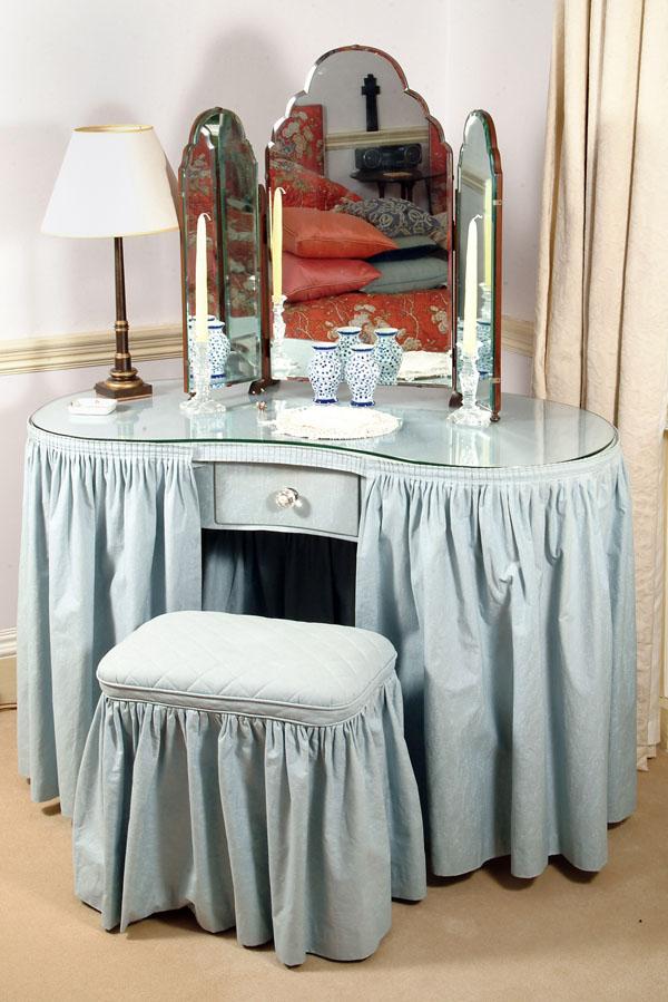 A Blue Cotton Covered Kidney Shaped Dressing Table