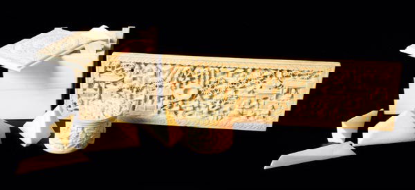 Three Chinese Canton ivory items, 19th century, co: Three Chinese Canton ivory items, 19th century, comprising a puzzle box, of cube form with sliding cover and pieces which fit together to form a cube, 5.2cm wide, a panel, carved in relief wi