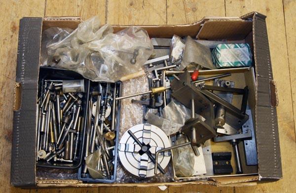 A collection of model engineering tools, to includ: A collection of model engineering tools, to include four jaw lathe chuck, reamers, files and sundry related items