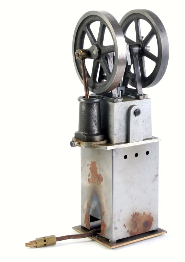 A Heinrici twin flywheel vertical hot air engine,: A Heinrici twin flywheel vertical hot air engine, built to the Edgar T Westbury design with cylinder 1in bore by 13/4in stroke, gas-fired, unpainted, 43cm high