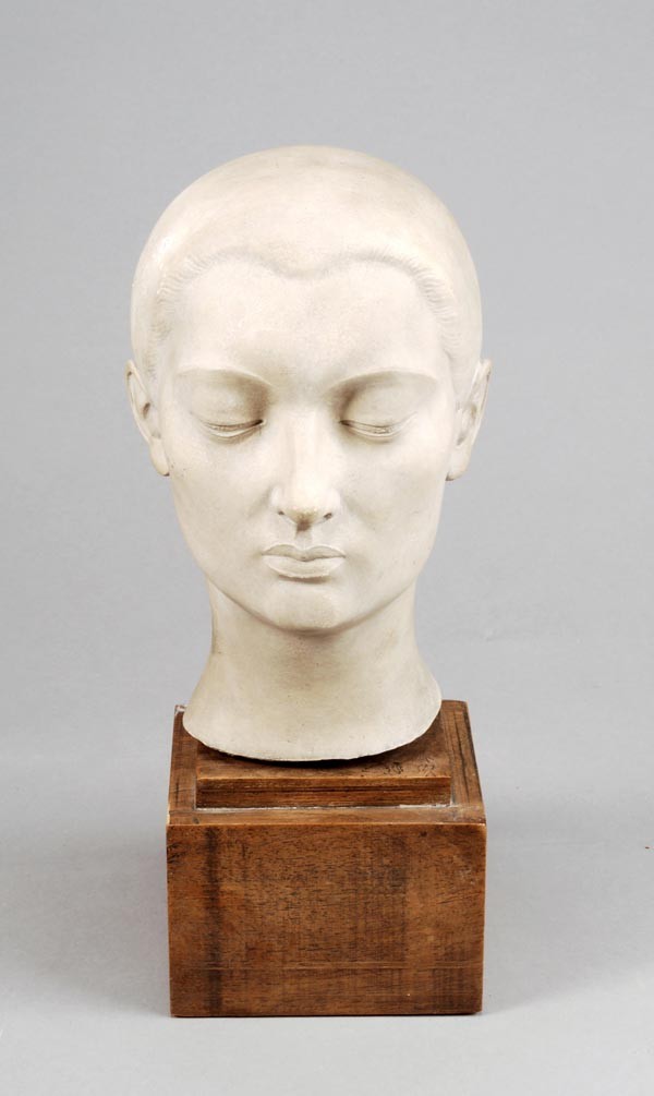 Gustave Piguet (Swiss, 1909-1976), a limestone bus: Gustave Piguet (Swiss, 1909-1976), a limestone bust of a young woman, inscribed 'G. Piguet' and dated (19)35, 24cm high, on a wooden block plinth, 34cm high overall
