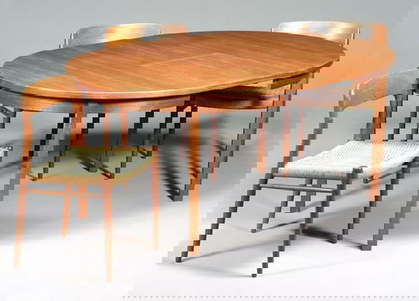 A Scandinavian teak dining table, circa 1970, circ: A Scandinavian teak dining table, circa 1970, circular with four half-leaved, 73cm high, 120cm diameter; and three Danish teak dining chairs by Nils Moller, circa 1954, model 75, with woven s