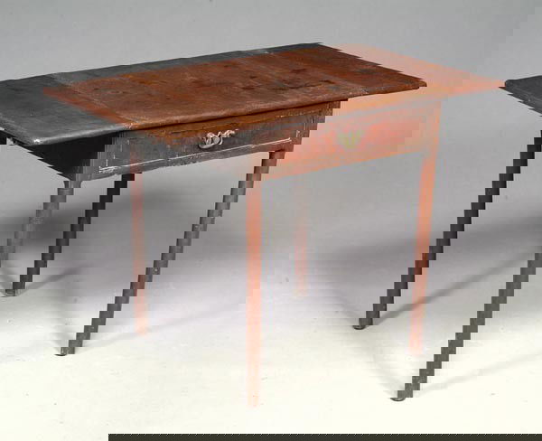 A George III mahogany drop leaf side table, circa: A George III mahogany drop leaf side table, circa 1760, in the manner of Thomas Chippendale, the twin hinged top above a drawer, on turned legs, 71cm high, 63cm wide, 62cm deep (unextended)<