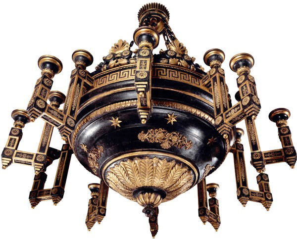 A carved wood, painted and parcel gilt chandelier: A carved wood, painted and parcel gilt chandelier with gilt lead mounts, leaf carved corona issuing four suspension chains attached at the circular dish carved with anthemion and paterae abov