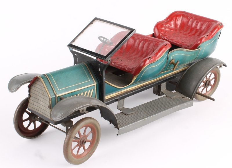 A Hans Eberl tinplate touring car, circa 1910, unm: A Hans Eberl tinplate touring car, circa 1910, unmarked, with 'Roi-des-Belges' style coachwork, a folding windscreen, handbrake lever, opening passenger doors, poseable front wheels, and a cl