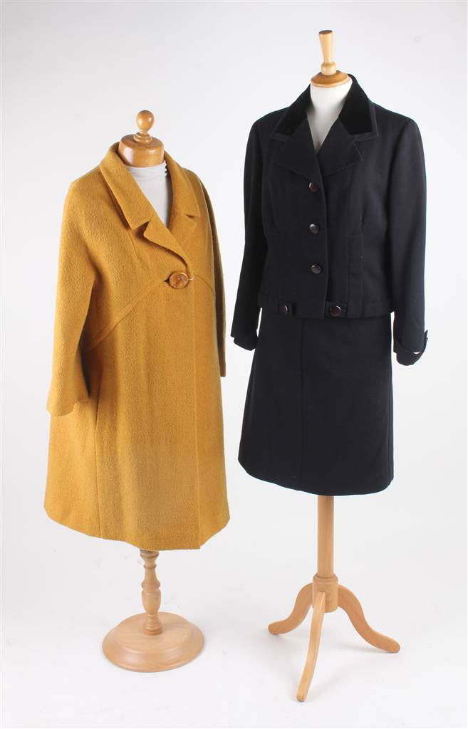 A 1960s Hardy Amies black jacket, with a velvet co: A 1960s Hardy Amies black jacket, with a velvet collar; together with a Prada black skirt; a 1960s Norman Hartnell mustard yellow coat; a pair of Joseph trousers; a pair of Jasper Conran small dog-too