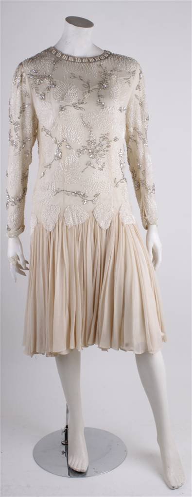A 1920s style sequin and beaded silk chiffon flapp: A 1920s style sequin and beaded silk chiffon flapper dress; together with a 1960s pink pearl beaded organza lace shift dress; a pale pink lace cocktail dress; and a 1980s Mike Benet designer white bea