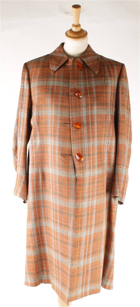 A collection of good quality vintage ladies coats,: A collection of good quality vintage ladies coats, circa 1960s-1970s, comprising examples made from tweed from Huntsman in London; a checked coat with faux amber buttons; a raincoat by Burberry; a pai