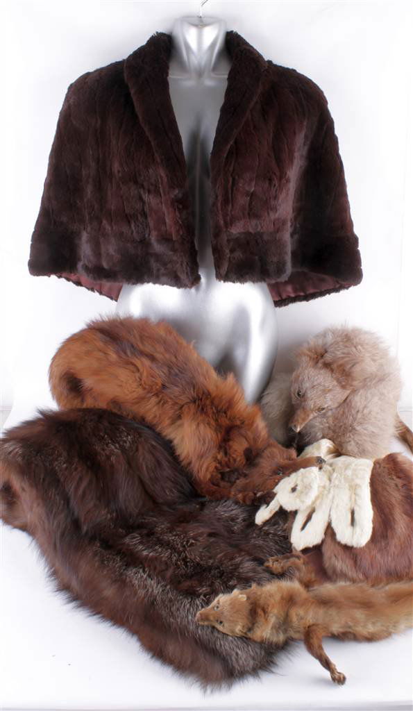 A collection of vintage furs, comprising a 1940s c: A collection of vintage furs, comprising a 1940s coney fur cape; a silver fox stole; a winter ermine tippet; and other fur stoles and collars.