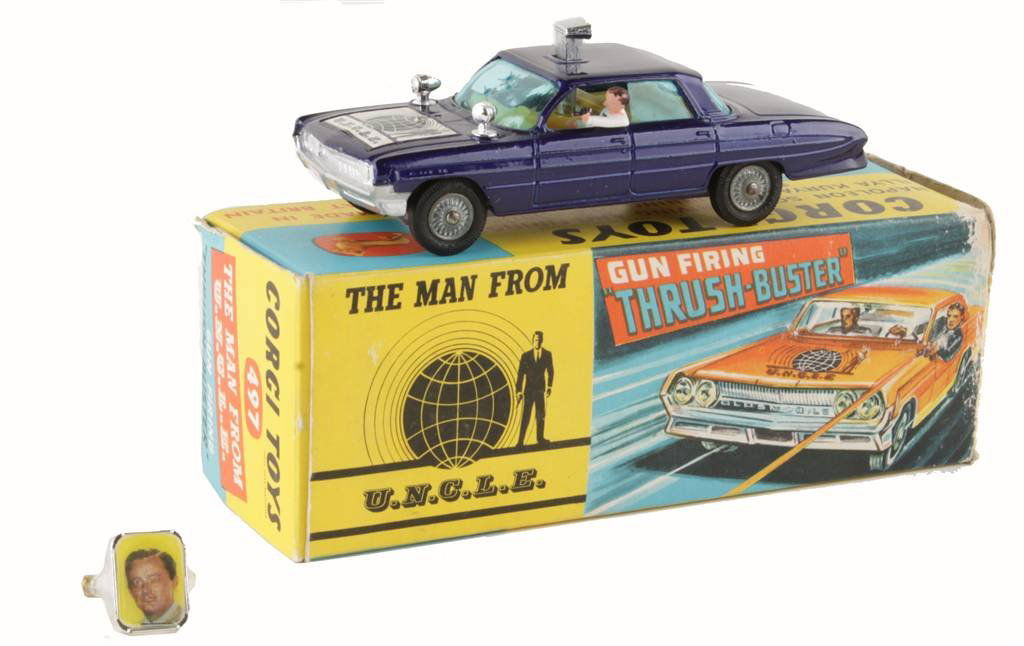A Corgi No.497, The Man from U.N.C.L.E. 'Thrushbus: A Corgi No.497, The Man from U.N.C.L.E. 'Thrushbuster' Oldsmobile Super 88, dark blue, plastic spotlights, very near mint, complete with Waverley ring (band broken and glue-repaired), boxed, with inne