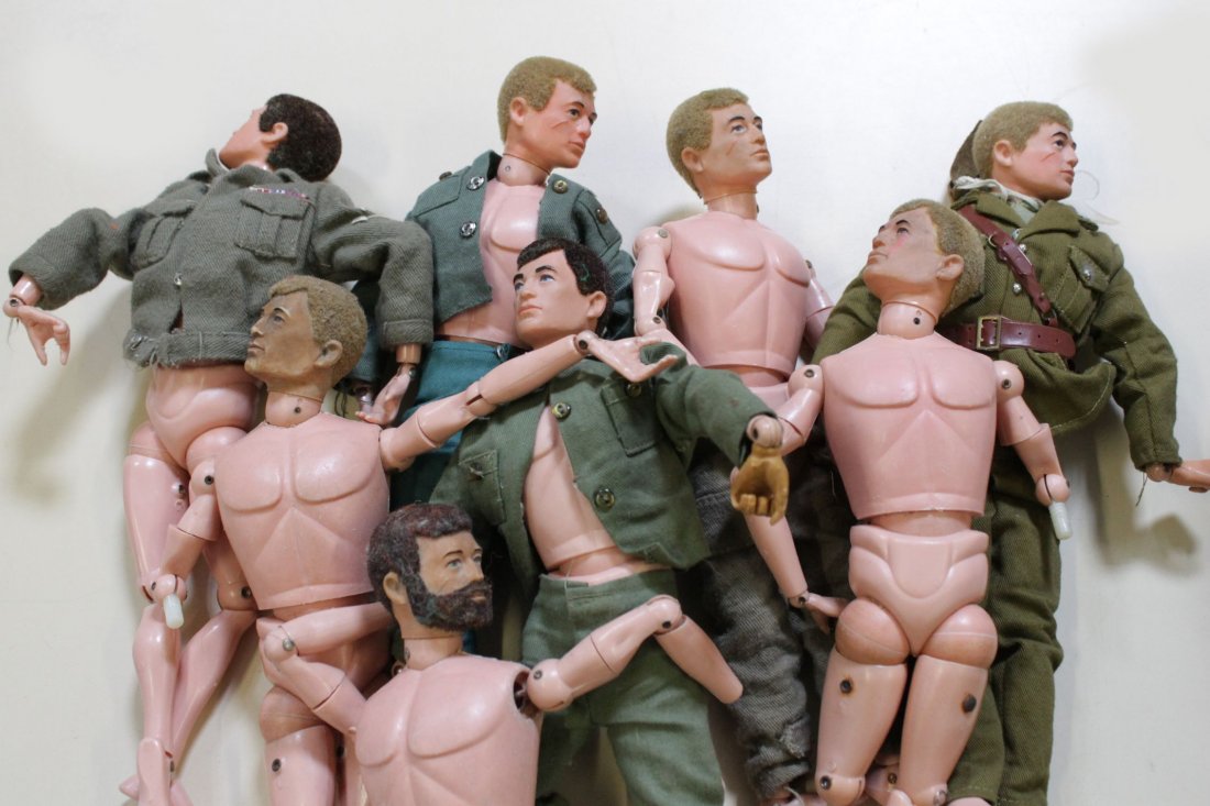 Four Action Man figures, three of them with hard