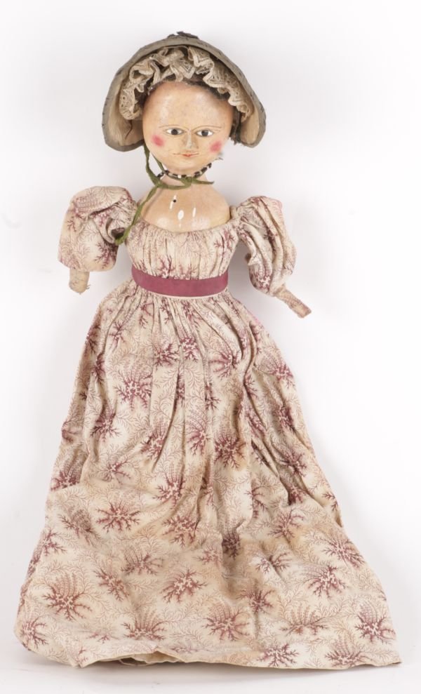 An early 19th century painted wooden doll, with i - 2