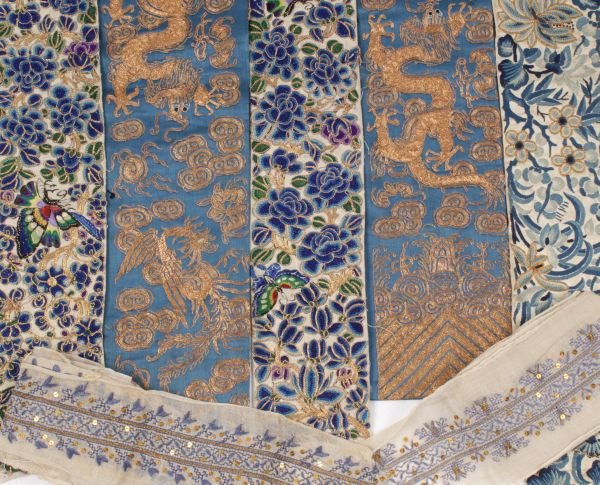 A collection of colourful silks and embroidered Or