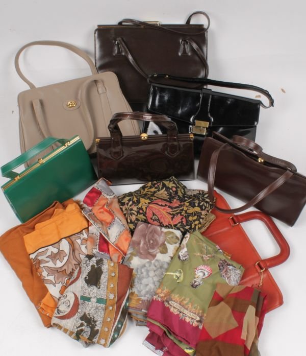 A collection of vintage handbags and scarves; com