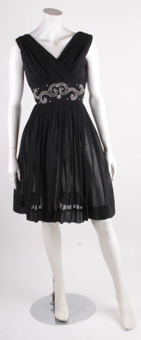 A 1950s black chiffon cocktail dress, with silver