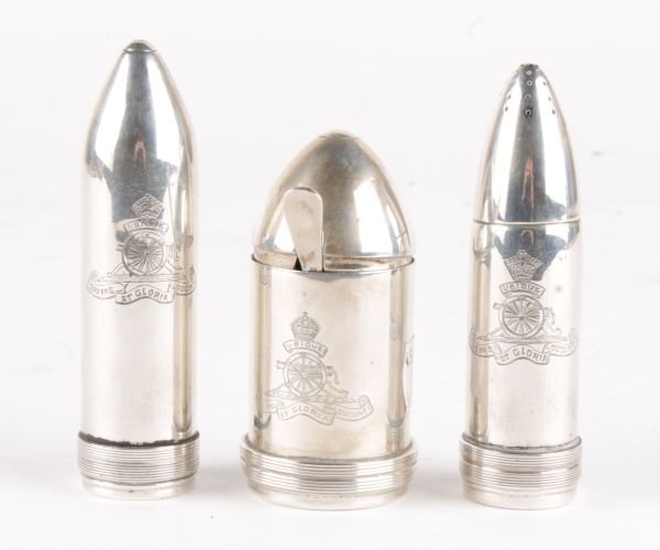 A matched silver novelty cruet set in the form of