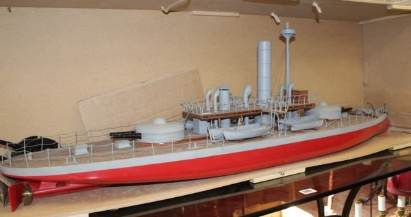 A model of the United States Navy monitor 'U.S.S.: A model of the United States Navy monitor 'U.S.S. Miantonomoh', with a plank effect deck, the superstructure removable for motorized operation, the hull painted grey over red, 123cm long, with a trans