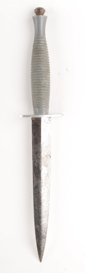 An F S Third Pattern Fighting Knife , standard spe: An F&S Third Pattern Fighting Knife, standard specification, with polished etched blade, bearing royal arms and motto, straight cross-guard and ringed grip, lacking sheath.