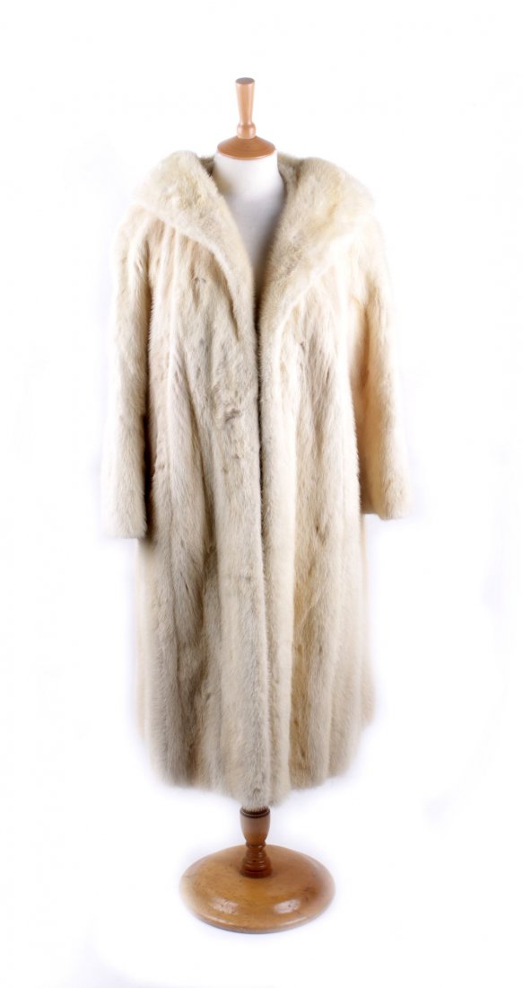 A late 1950s full length pale mink fur coat, label: A late 1950s full length pale mink fur coat, label reads 'FK Bowers & sons, Bristol', ivory coloured lining, (in fair condition, the fur around the cuffs has some wear).