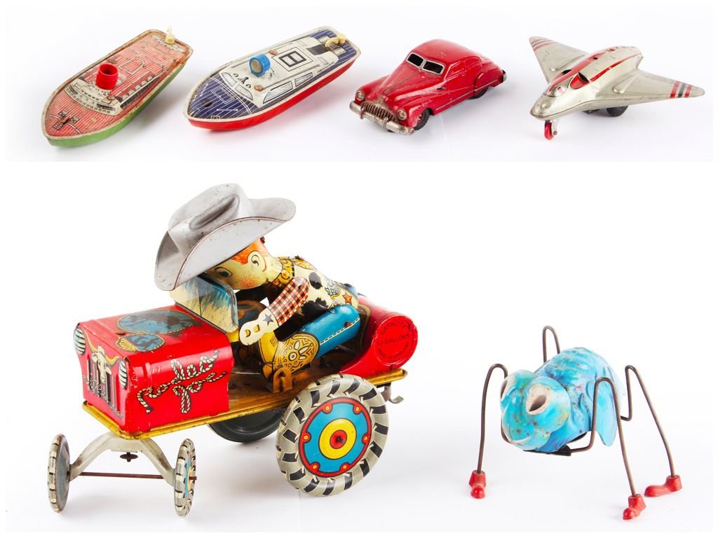 A tinplate Gama Tank, dark grey with white rubber: A tinplate Gama Tank, dark grey with white rubber tracks, fitted with a clockwork mechanism (untested), unboxed; a tinplate Gama (Schuco patent) saloon car, red, fitted with a clockwork mechanism (unt