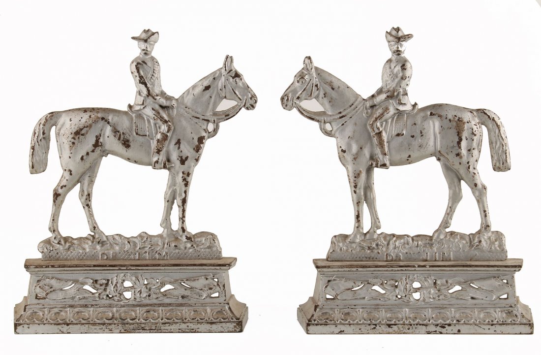 [Militaria] An Unusual Pair of Boer War Period Cast: An Unusual Pair of Boer War Period Cast Iron Soldiers on Horseback Doorstops, each marked Dr. Jim, Rd. no.281239 and no. 1550, circa 1895, 26cm high The Jameson Raid was an ineffective attempt to over