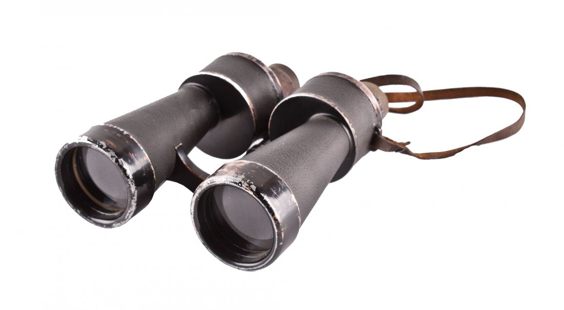 A Pair of Second World War German Kreigsmarine7 x 50: A Pair of Second World War German Kreigsmarine7 x 50 Binoculars by E. Leitz Wetzlar No.301630 , bearing large eagle device above 'M' and ' N -19659', black leather covered frame, with good clear adjus