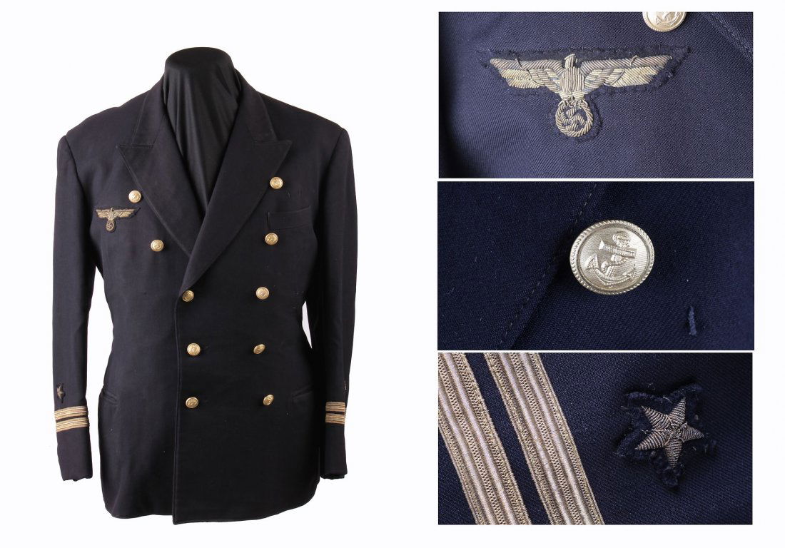 A Second World War German Kriegsmarine Officer's Tunic: A Second World War German Kriegsmarine Officer's Tunic , blue cloth, double-breasted with gilt buttons and cloth insignia.