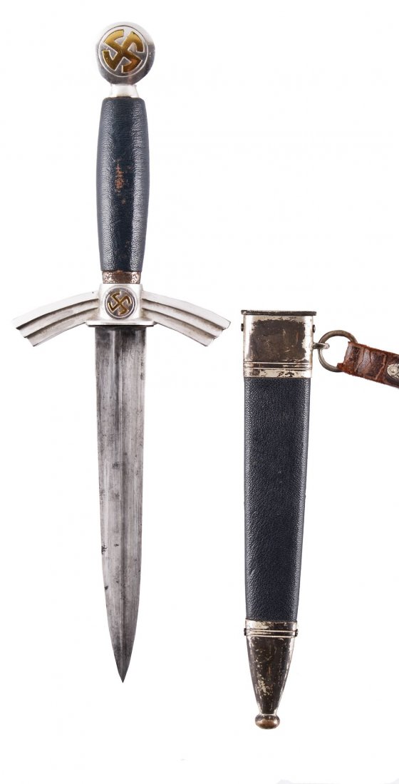 An Unusual Model 1934 DLV - NSFK Service Dagger with: An Unusual Model 1934 DLV - NSFK Service Dagger (Flyer's Knife) with Hanger , modified as a 1st model Luftwaffe dagger, silver-plated cross-guard and pommel disc with sun wheel swastikas, blue leather