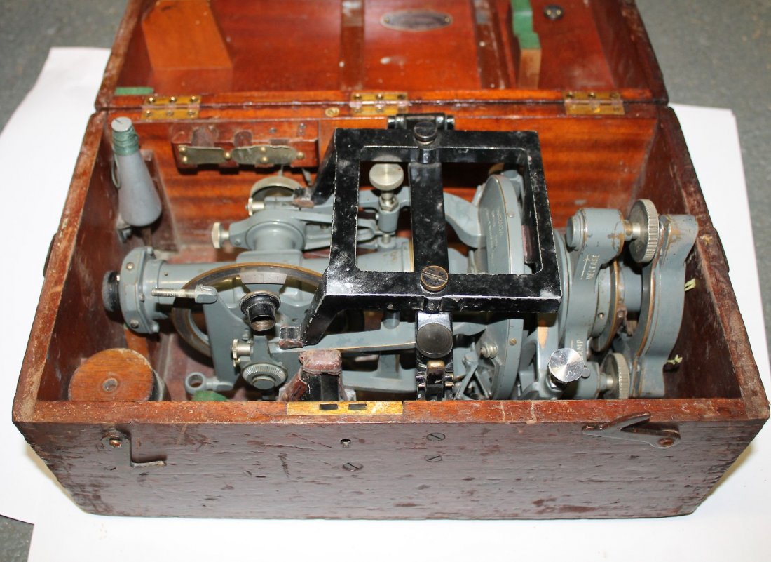 Two Cooke Troughton & Simms theodolites, both with: Two Cooke Troughton & Simms theodolites, both with original wooden cases; together with a Hiliger & Watts theodolite and alignment target, both in original cases, (4).