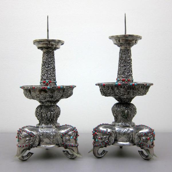 Pair of Mongolian Silver-Clad Prickets: Pair of Mongolian silver-clad prickets, inlaid with semi-precious stones and supported by elephant heads with jade tusks. Probably circa late 19th/early 20th century.