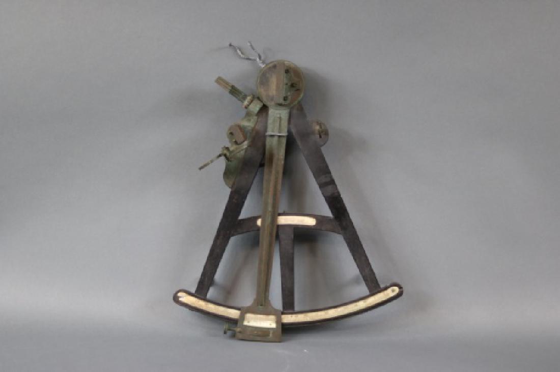 Ebony Navigational Octant: Ebony ship's octant with brass index arm, peepsight, filters, mirrors etc.. Scale with marked degrees. 14â€ x 12â€