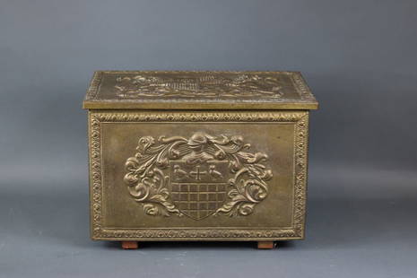 Brass Clad English Kindling Box: Kindling box. A pair of lions hold a shield on the lid of this brass clad metal box. 18” long x 12” wide x 12 1/2” tall