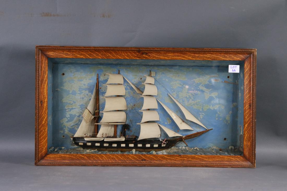 Nautical shadow box of a barque: Vintage marine shadow box showing an American steam barque under full sail. With varnished deck, steam funnel and two lifeboats. Oak frame. 36 x 6 x 20