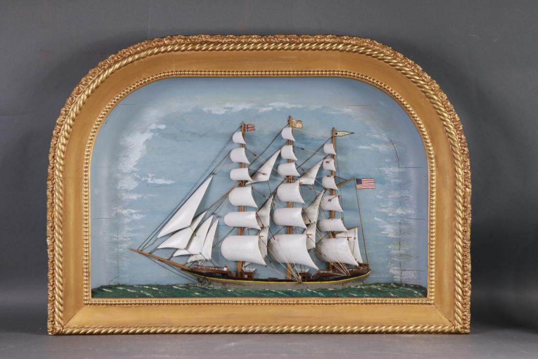 American clipper ship shadowbox model: Stately American clipper ship model set into a shadow box. Interesting arched top glass panel and frame. Ship is identified as the GJOA. 37 x 5 x 27