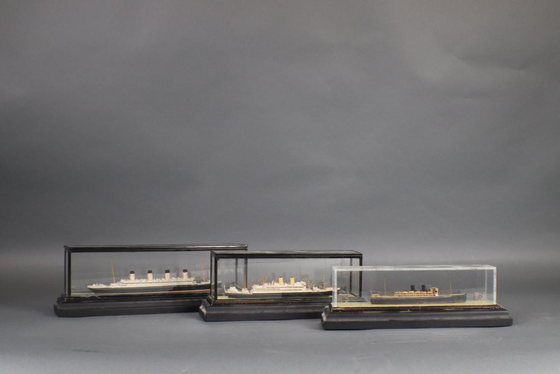 Basset Lowke Ship Model Lot: Group of three Basset Lowke ocean liner models. Represented are Olympic, Empress of Scotland, and Chitral. Longest 9â€