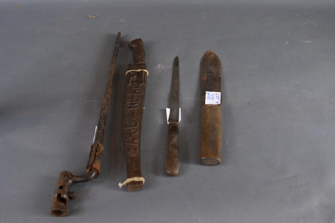 Philippine trench art knife: Four edged weapons as a lot including a finely carved knife sheet with made in PI carved in relief. Also a bayonet machete and a long thin blade marked JOSEPH HOUGBERG AND SONS, CUTTERS TO HER MAJESTY