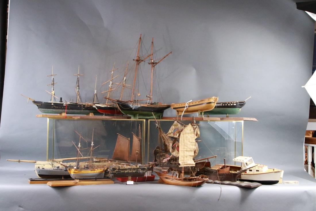 Fleet of fourteen ship models: Group of fourteen boat models, all needing work. Ships include frigates, brigs, schooners, sampan, lobster boat etcâ€¦ Excellent group for a restorer.