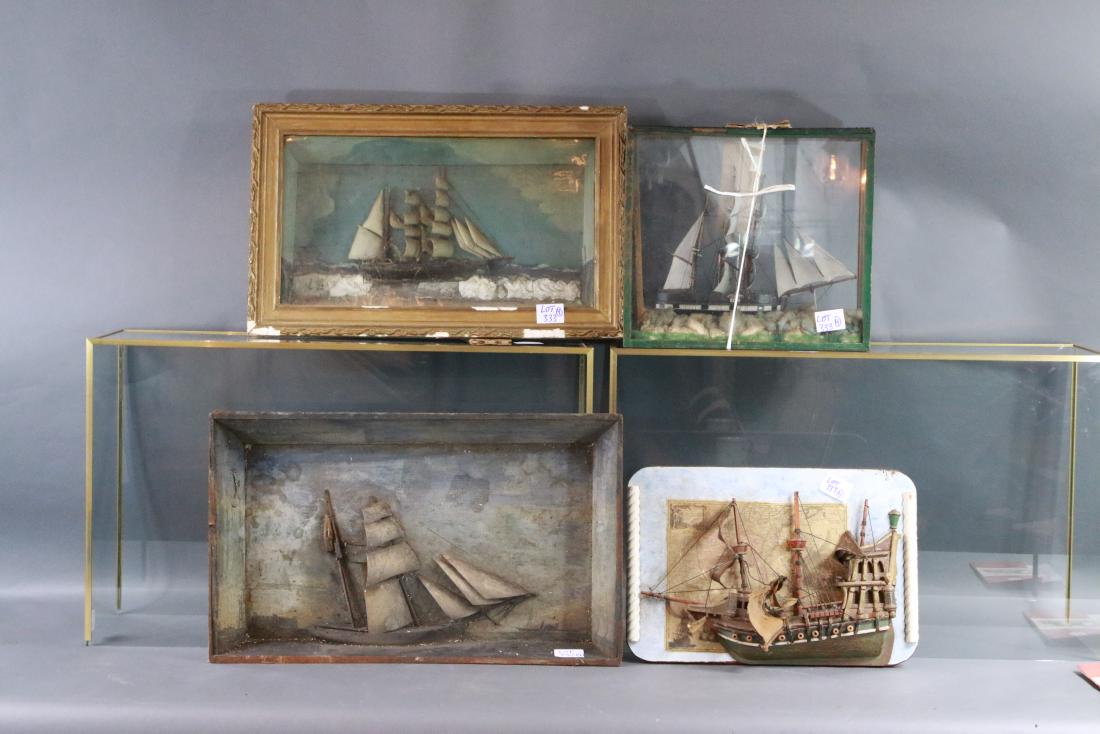 Ships shadowboxes and diorama: Group of four boat models including two marine shadowboxes a galleon on plaque and a charming folk art model in a case, all needing work. editing assistance from Dan