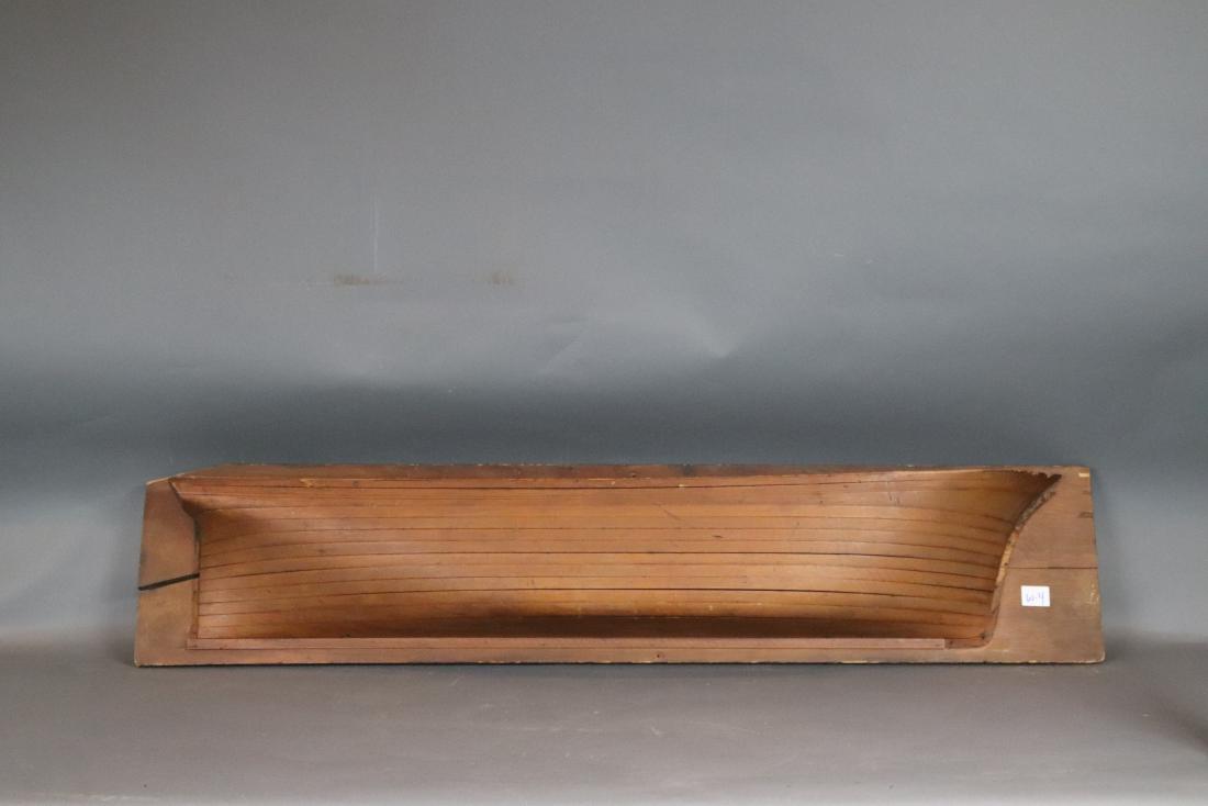 Nineteenth Century ship half model: Large, builders half model of a medium clipper or windjamer. THIS IS MID NINETEENTH CENTURY....Consigned from a Maine collector, this hull is laminated in thirteen lifts. Mounted to a backboard. 62 x 