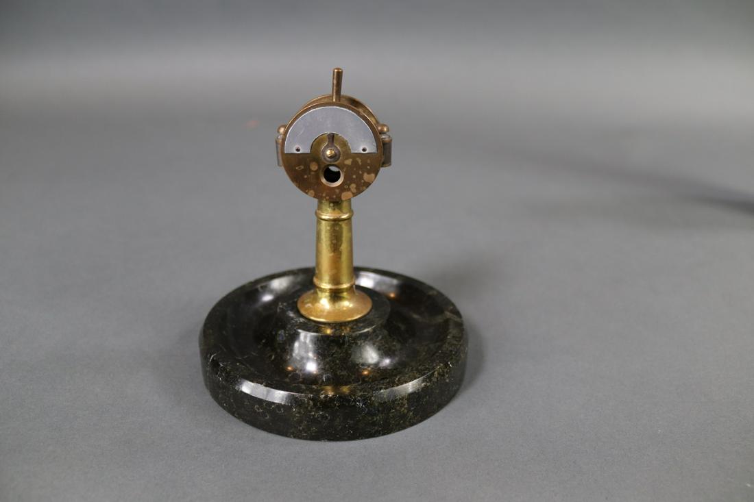 SHIP TELEGRAPH CIGAR CUTTER: Ship telegraph cigar cutter with marble base. brass telegraph. Dimensions: 5 wide by 6 tall