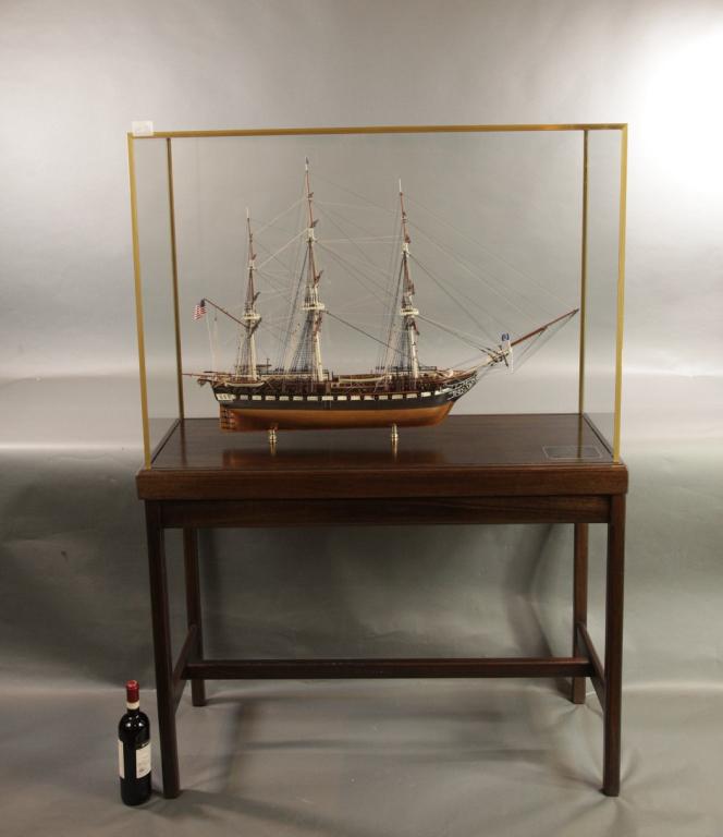 MUSEUM QUALITY MODEL OF THE USS CONSTITUTION: Very fine model of the American frigate USS Constitution. With complex rigging, including standing and running rigging, clove hitched ratlines etc.. the three masts are in perfect symmetry. The hull,i