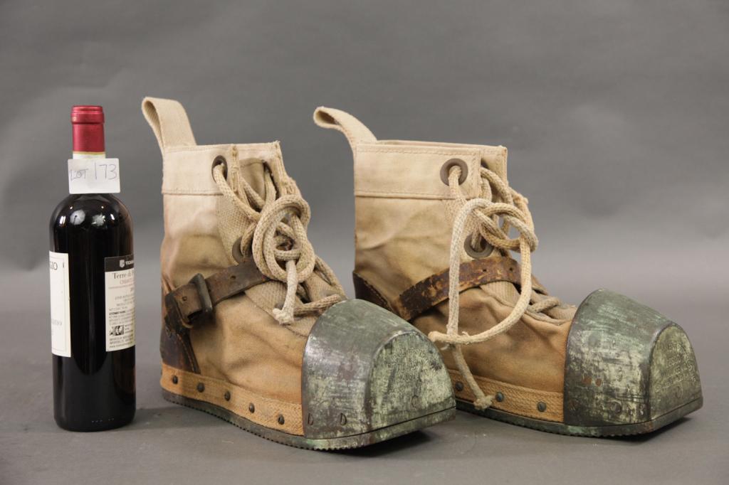 PAIR OF DESCO SUPPLY DEEP SEA DIVERS BOOTS: Pair of deep sea divers boots. Bronze toe tip is marked DIVING EQUIPMENT SUPPLY CO INC. Canvas and bronze diving boots used by hard hat divers. 10T X 14L X 4W