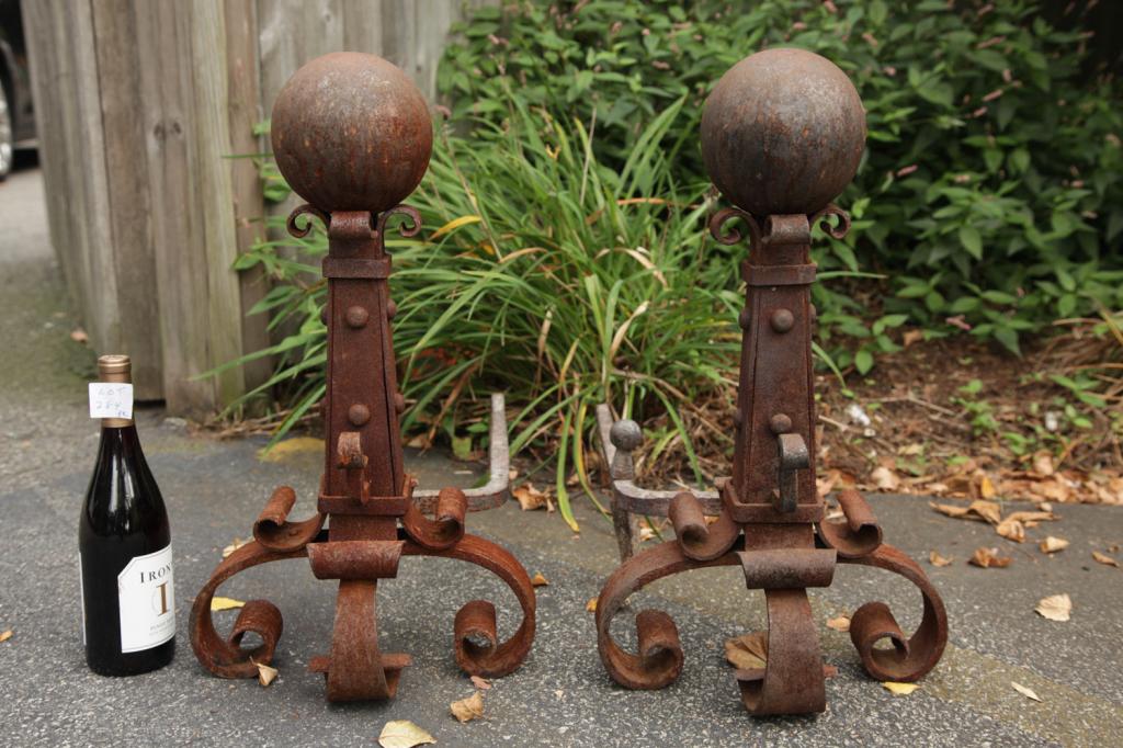 LARGE PAIR OF IRON ANDIRONS: Large pair of iron andirons with an arts and crafts look. 23H X 13W