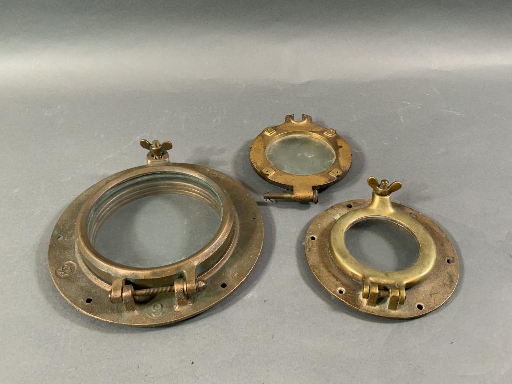 GROUP OF THREE BRASS BOAT PORTHOLES (1 of 4)