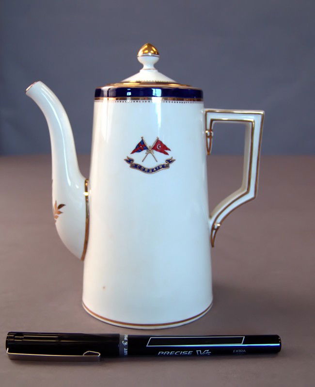 Mintons teapot from JP Morgan's Corsair.: Rare, porcelain teapot from J. Pierpont Morgan's private steam yacht "Corsair". Emblazoned with crossed flagstaffs with the New York Yacht Club burgee and JP Morgan's private signal flag. Further deta