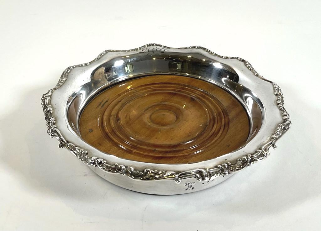 Steam Yacht Aztec Wine Coaster: Silver wine coaster from the large and elegant steam yacht "Aztec". Aztec was launched in 1902 to the Lewis Nixon Company in New Jersey. She served in the US Navy during WWI as an escort vessel for su