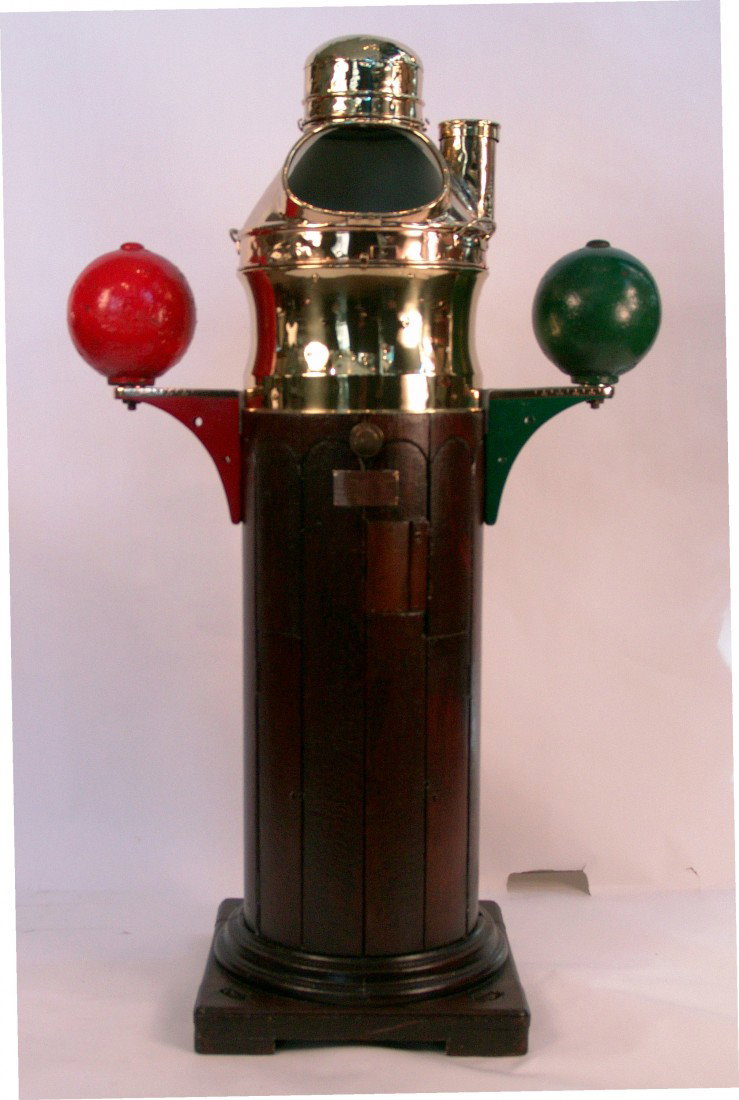 19th century ship's binnacle.: Early ship's binnacle of the type found on clipper ship's in the mid 18th century. Fitted with a dry card compass from the Lord Kelvin Compass Company. Compass shows deterioration to the card. Base is