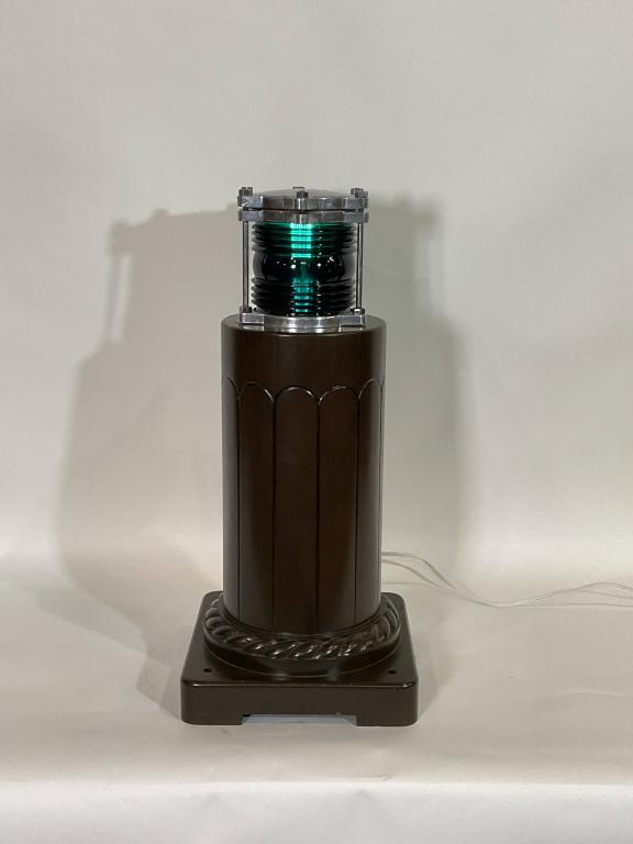 Aluminum Pier Light on stand: Dimension: 27" H x 12"L x 12" D, 23 lbs. Aluminum maritime beacon that has been meticulously polished and lacquered. Mounted to a custom made display base with carved rope trim.