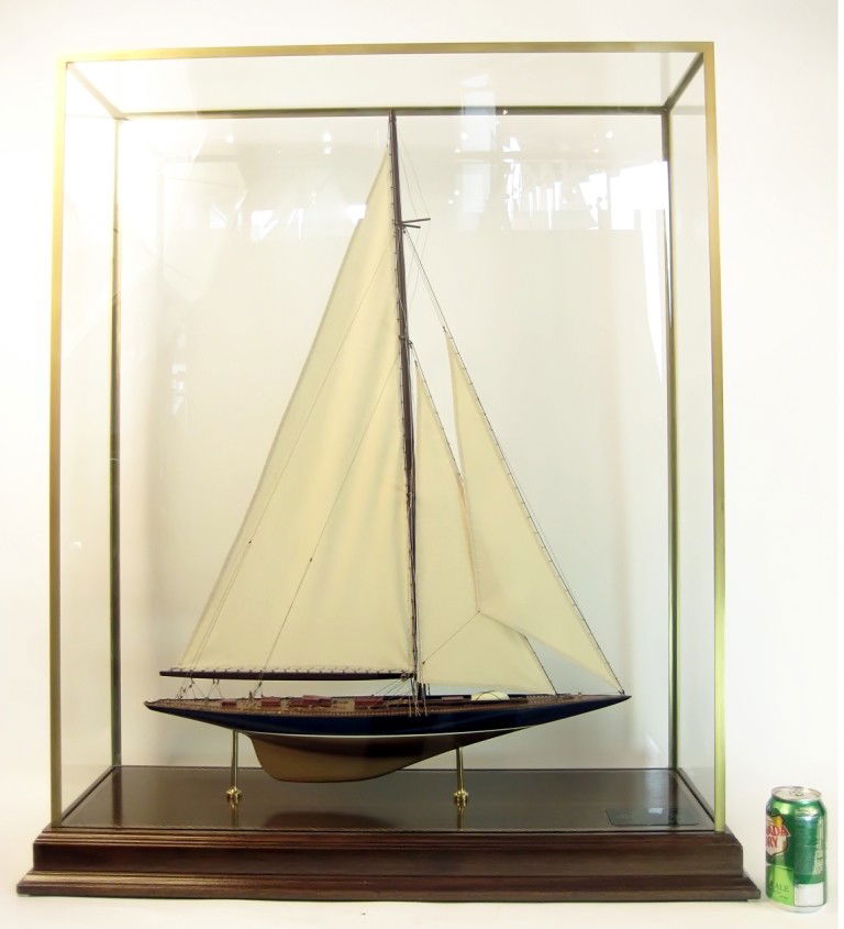 Yacht "Endeavour": Scale model of the British “J” Class Yacht “Endeavour”. Planked deck with winches, toe rails, skylights, companionway, wheel, binnacle, etc… Rigged with a suit of stitched linen sails. Mount