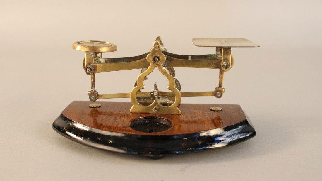 Edwardian, Antique Postal Scale.: Brass English postal scale on a wood stand. Without weights. 7" long x 3" high. Early 20th century.